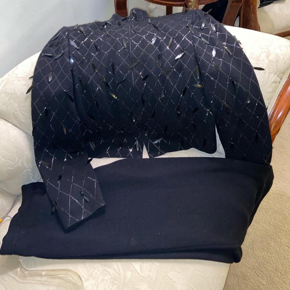 A black knit jacket and knit skirt.